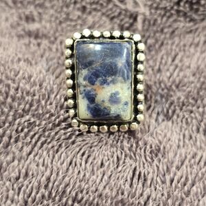 Elegant Blue Stone Ring with Silver Beaded Frame